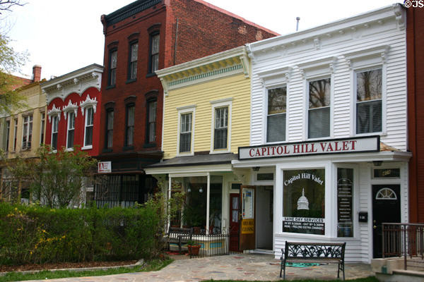Italianate houses of 400 block of East Capitol St. including Capitol Hill Valet shop. Washington, DC.