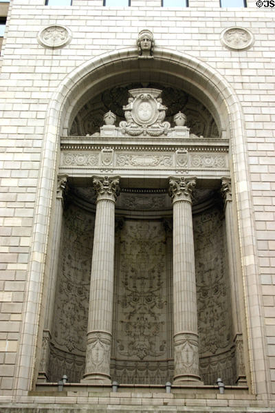 Details of reliefs in niche of National Press Building (1927). Washington, DC.