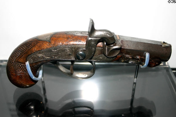 Deringer gun used by John Wilkes Booth to kill Abraham Lincoln, now in Ford's Theatre museum. Washington, DC.