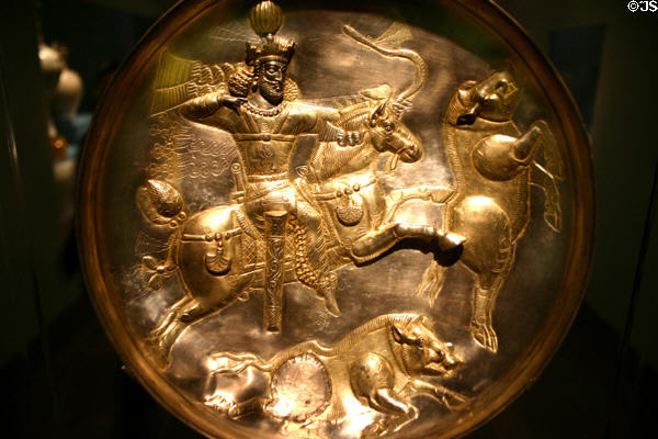 Gilt-silver plate showing horseman hunting boars from Sasanian period of Persia (300-400) in Sackler Gallery. Washington, DC.