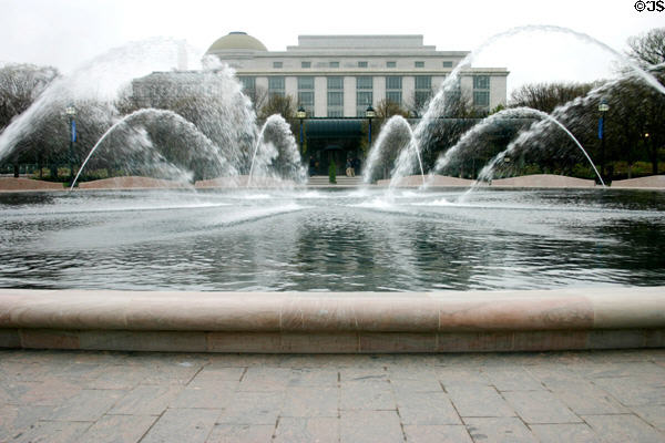 Fountain in National Sculpture Garden with National Museum of Natural History in Background. Washington, DC.