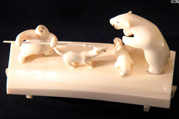 Inuit hunting polar bear ivory carving (1958) by Aloysius Pikonganna or Nome, AK at National Museum of the American Indian. Washington, DC.
