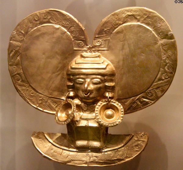 Gold ornament of human with earrings (500-1200) from Restrepo, Colombia at National Museum of the American Indian. Washington, DC.