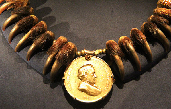 James Buchanan peace medal (1857) on bear claw necklace at National Museum of the American Indian. Washington, DC.