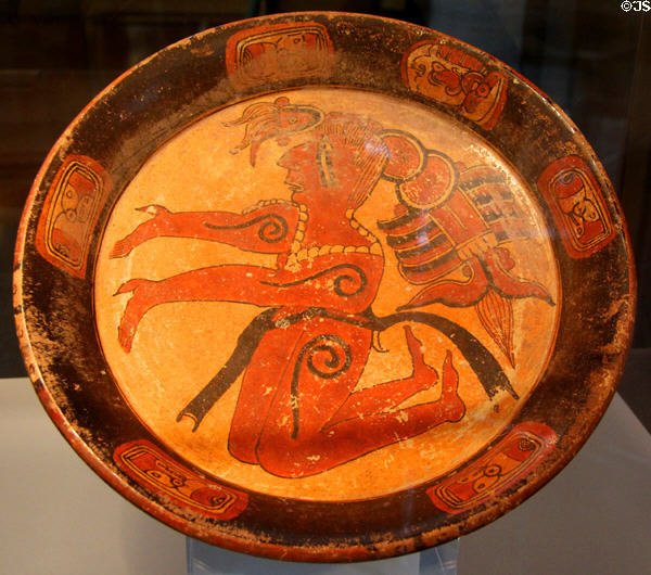 Late Classic Mayan ceramic polychrome tripod plate painted with figure with headdress (600-700 CE) from Mexico at Dumbarton Oaks Museum. Washington, DC.