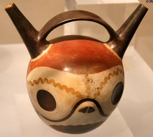 Wari ceramic stirrup-spout bottle painted with skull effigy (650-1000) from Peru at Dumbarton Oaks Museum. Washington, DC.