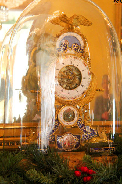Glass dome enclosed French Empire mantle clock (1795) from Paris apartment of Louis XVI at Tudor Place. Washington, DC.