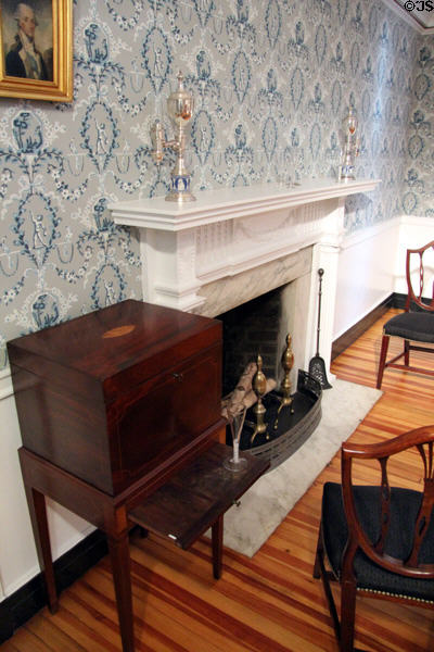 Mahogany cellarette (1790-1810) from North Carolina or Virginia beside fireplace in Virginia period dining room (1800-10) at DAR Memorial Continental Hall. Washington, DC.