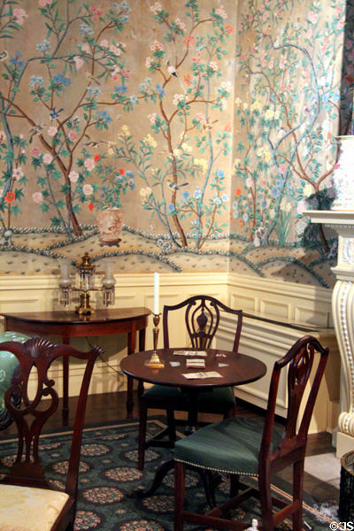 Card & side tables under reproduction Chinese-style hand painted wallpaper in New York period parlor (1820s) at DAR Memorial Continental Hall. Washington, DC.