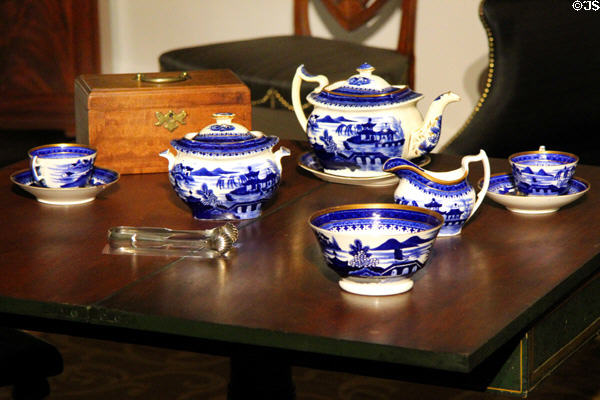 Bone china tea set with dark blue transfer print (1815-35) possibly from Staffordshire, England in Maryland period parlor at DAR Memorial Continental Hall. Washington, DC.
