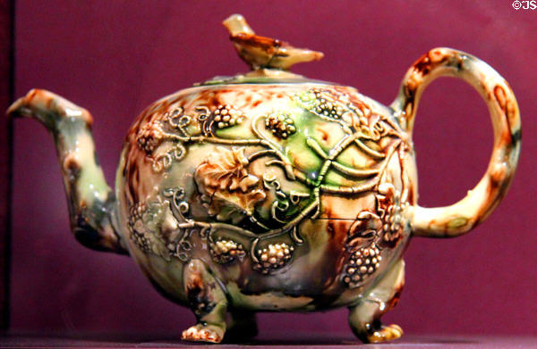 Creamware teapot with colored lead glazes (c1760) from Staffordshire, England at DAR Memorial Continental Hall Museum. Washington, DC.
