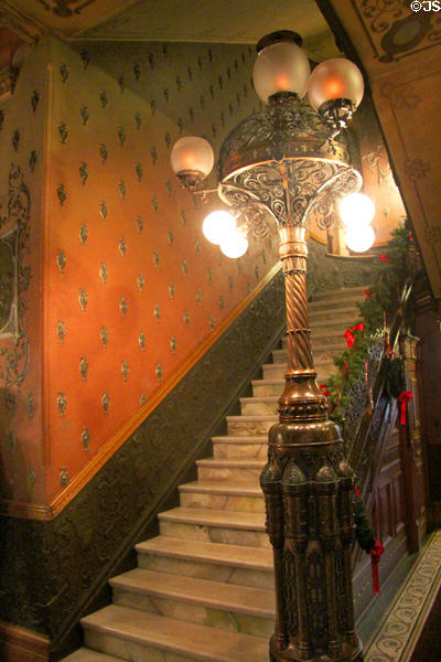 Entrance hall staircase lampstand which used gas or electricity at Christian Heurich Mansion. Washington, DC.