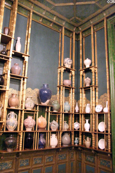 Antique pottery vase collection in Peacock Room at Smithsonian Freer Gallery of Art. Washington, DC.