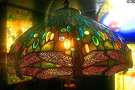 Signed Tiffany stained glass lamp with bronze (late 19thC) at Lightner Museum. St Augustine, FL.
