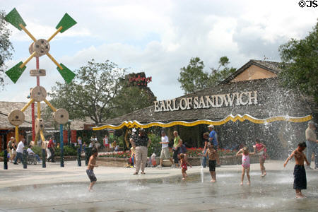 Visitors enjoy fountains at Downtown Disney. Disney World, FL.