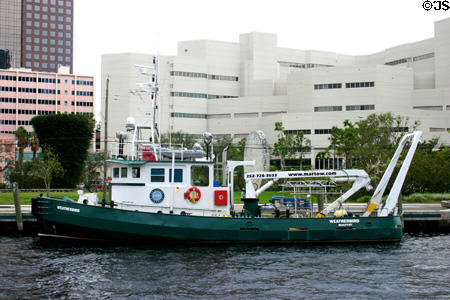 Broward County Jail over working boat on New River. Fort Lauderdale, FL.