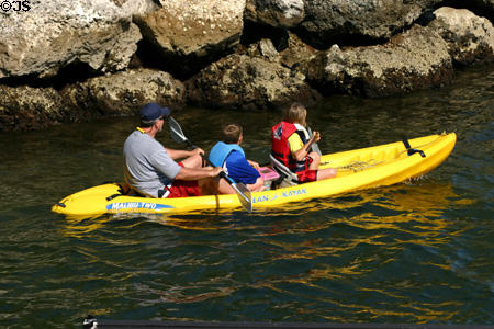 Family kayaks at Vizcaya Museum & Gardens. Miami, FL.