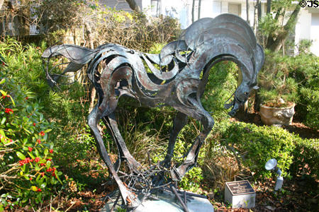 Running horse titled Energy in Copper (1996) by Roland Hockett in sculpture garden of Lemoyne Art Gallery. Tallahassee, FL.