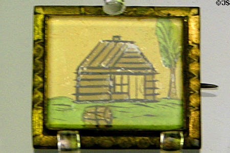 Log cabin campaign pin from 1840 election of William Henry Harrison in museum of old State Capitol. Tallahassee, FL.