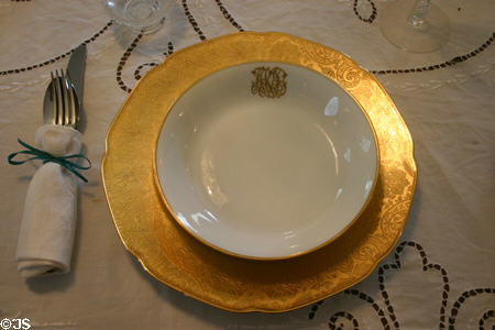 Gold table setting in dining room of Knott House Museum. Tallahassee, FL.