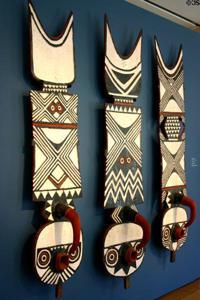 Three wooden Nwantantay masks (1987) by Burkina Faso artist Yacouba Bondé in African art collection at High Museum of Art. Atlanta, GA.
