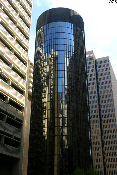 Round black glass tower addition (1971) to Hyatt Regency Atlanta (1967) (24 floors). Atlanta, GA. Architect: John Portman & Assoc..