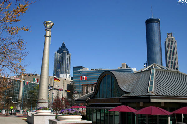 Centennial Olympic Park visitor center with Atlanta's skyline. Atlanta, GA.