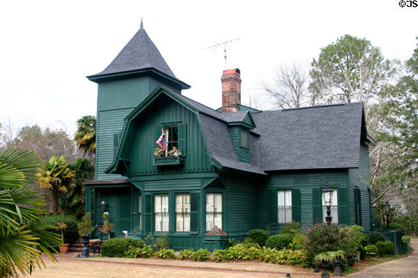 Green Dutch-colonial-style house in Tockwotton Historic District (437 Remington Ave.). Thomasville, GA.
