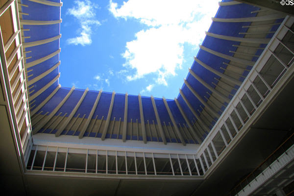 Central courtyard blue roof open to sky of Hawaii State Capitol. Honolulu, HI.