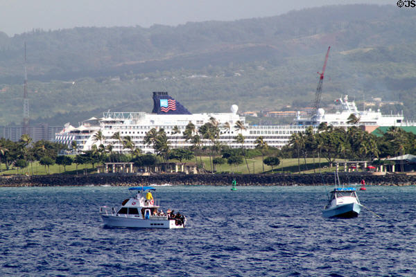 Cruise ships against hills of Honolulu. Honolulu, HI.