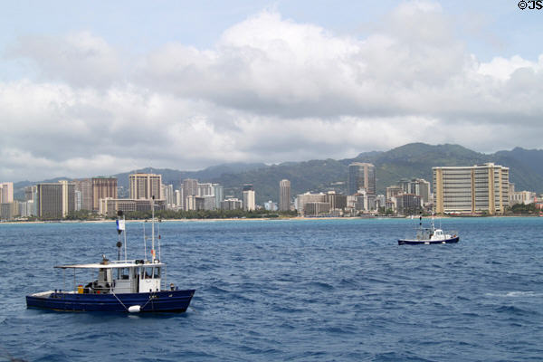 Waikiki skyline from Hilton Hawaiian Village through Sheraton Hotel seen from sea. Waikiki, HI.