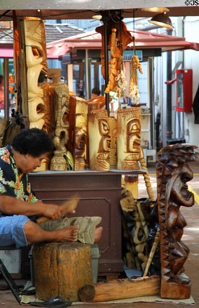 Wood carver shop at International Market Place. Waikiki, HI.