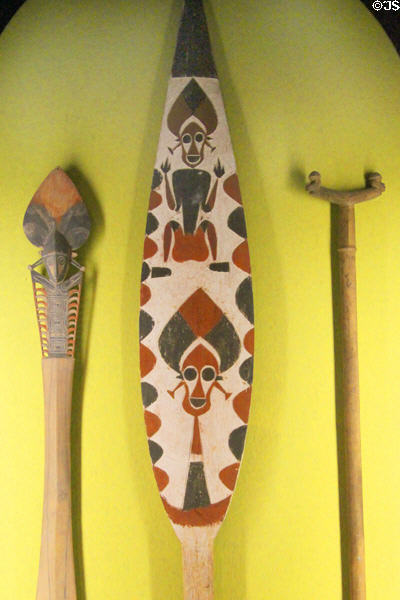 Solomon Islands canoe paddles and prow ornaments at Bishop Museum. Honolulu, HI.