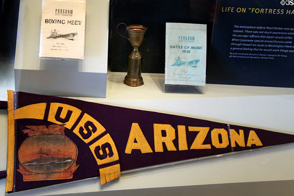 USS Arizona pennant (c1940s) & mementos at Arizona Memorial museum. Honolulu, HI.