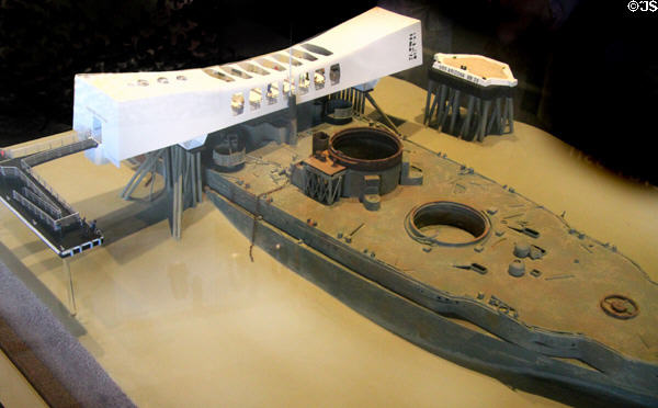 Model of USS Arizona memorial as it sits over sunken battleship at Arizona Memorial museum. Honolulu, HI.