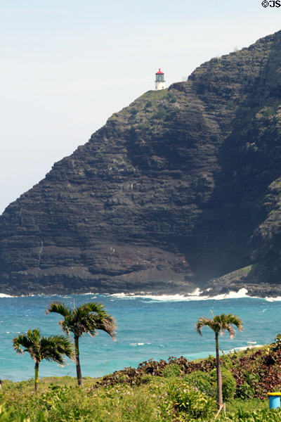 Makapu'u Lighthouse (1909) sits atop cliffs seen from Sea Life Park. HI.