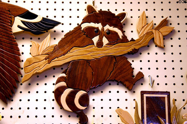 Wooden raccoon wall decoration at Schanz Furniture Shop. South Amana, IA.