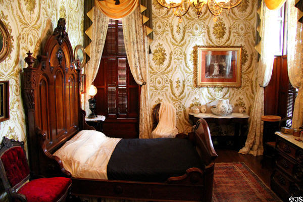 Bedroom with elaborate wallpaper at Dodge House. Council Bluffs, IA.