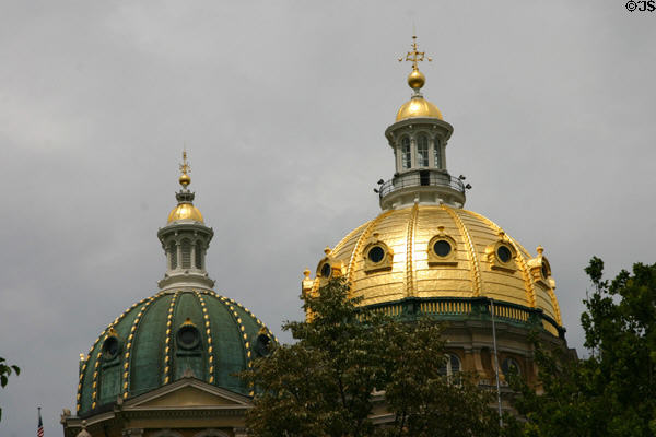 Two domes of Iowa State Capitol, one gold, one green. Des Moines, IA.