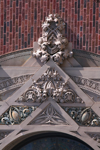 Terra cotta decoration to right of rose window of Merchants' National Bank. Grinnell, IA.