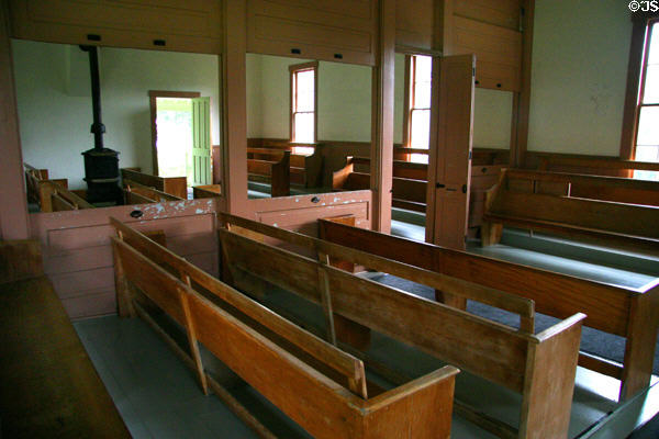 Interior of Friends or Quakers Meeting House divided between male & female sections on Herbert Hoover National Historic Site. West Branch, IA.