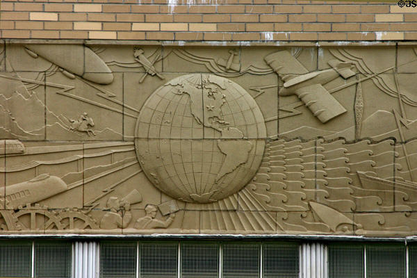 Art Deco relief of transportation & communication, aircraft & ships on Old Iowa City Press-Citizen Building. Iowa City, IA.