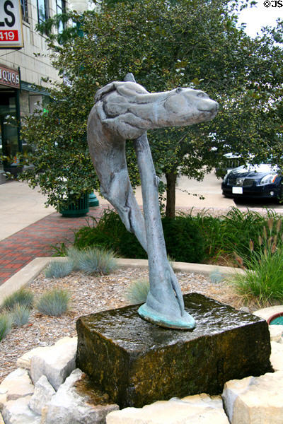 Sculpture of swimming otter (5th Av. at S. 2nd St.). Clinton, IA.
