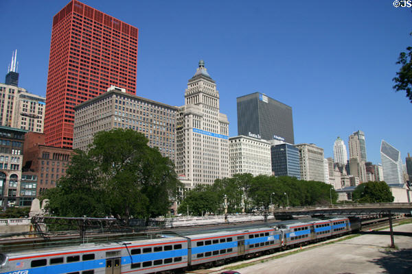 Buildings of South Michigan Avenue over Chicago METRA commuter train. Chicago, IL.