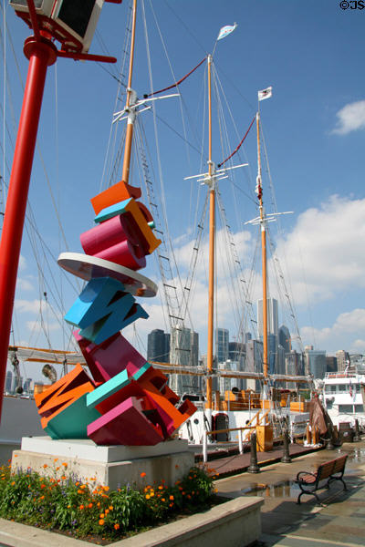 Statue of piled letters & 4-masted ship on Navy Pier. Chicago, IL.