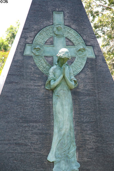 Sculpted cross with weeping cross on Monument (1905) to James Y. Sanger in Graceland Cemetery. Chicago, IL.