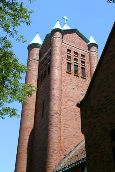 Tower with cylindrical corners of St. Gabriel Church. Chicago, IL.