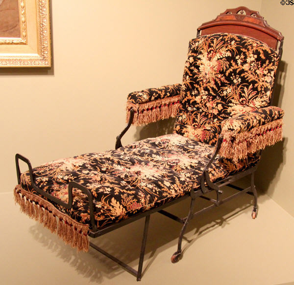 Metal-framed folding chair (1876) by Cevedra B. Sheldon made by Marks Adjustable Folding Chair Co. of New York City exhibited at Chicago World's Fair at Art Institute of Chicago. Chicago, IL.