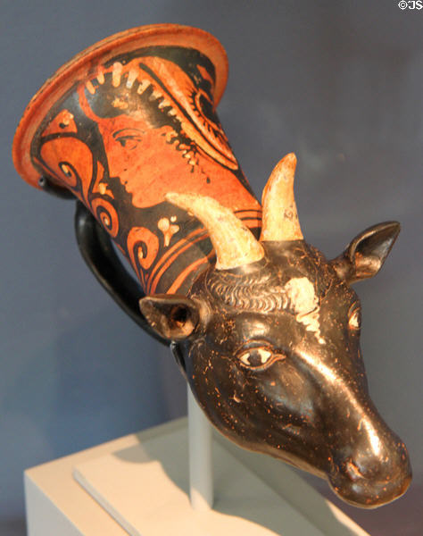 Greek terracotta red figure Rhyton (drinking vessel) in shape of sheep's head (c340-330 BCE) from Apulia, Italy at Art Institute of Chicago. Chicago, IL.