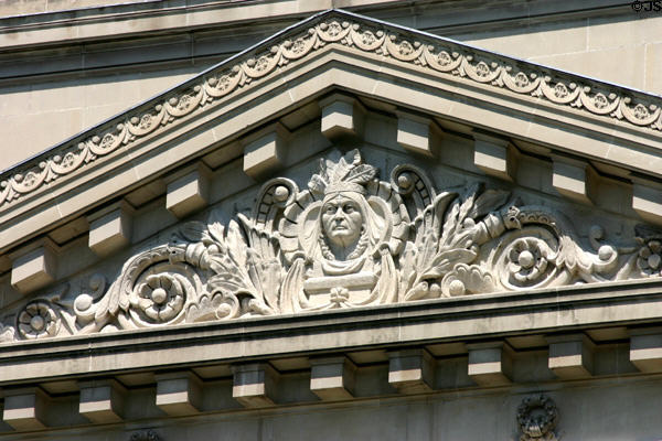 Indian face with feather headdress carved in pediment of State Capitol. Indianapolis, IN.